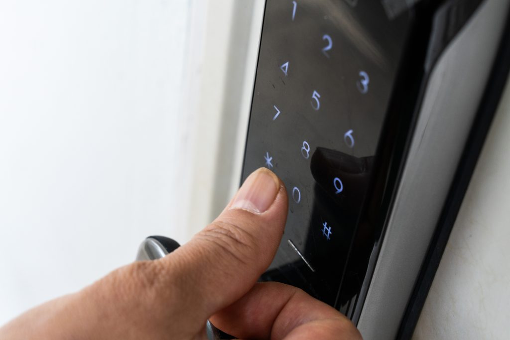 clicking on the lock of the apartment house